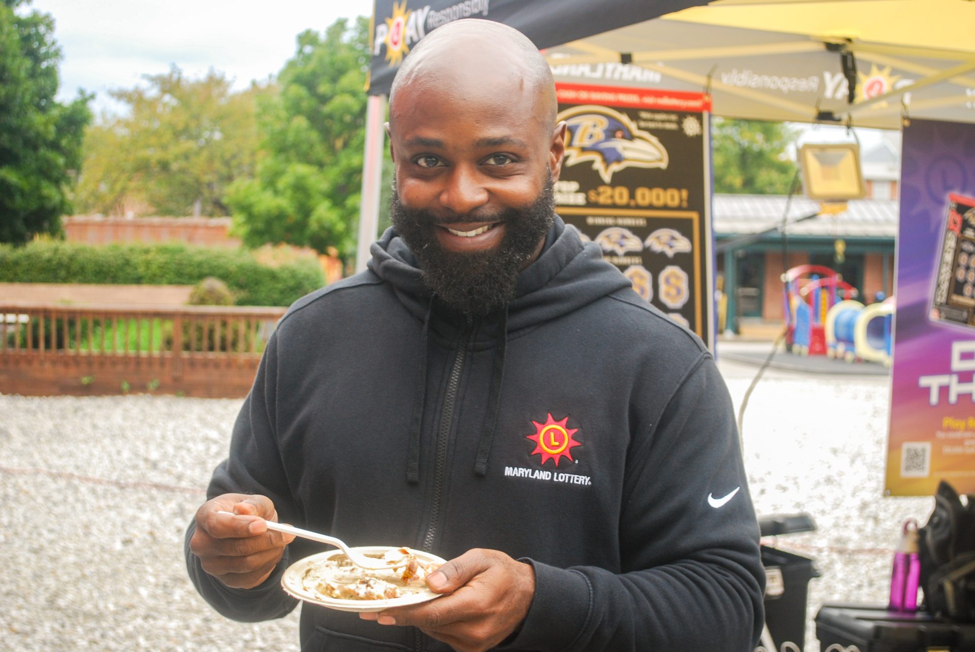 Man smiling and eating oysters