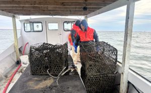 Boat with old borken crab traps aboard